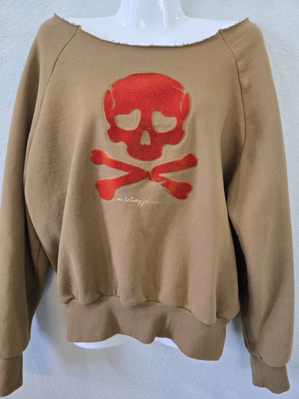 Brown Sweatshirt with Orange Skull & Crossbones Graphic